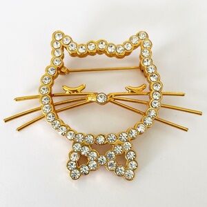 Vintage gold rhinestone cat bow brooch